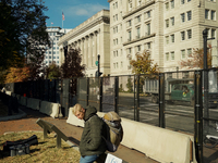 A man with a sign is seen in Lafayette Park in Washington DC, USA on 05 November, 2024. (