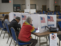 People cast their votes on Election Day in Fairfax County, Virginia, on November 5, 2024. (