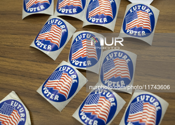 Future Voter stickers are seen in a Vote Center in Fairfax County, Virginia, on November 5, 2024. 