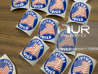 Future Voter stickers are seen in a Vote Center in Fairfax County, Virginia, on November 5, 2024. (