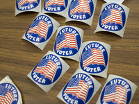 Future Voter stickers are seen in a Vote Center in Fairfax County, Virginia, on November 5, 2024. (