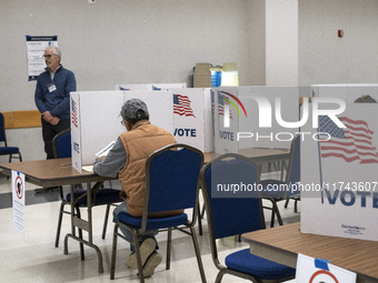 People cast their votes on Election Day in Fairfax County, Virginia, on November 5, 2024. (