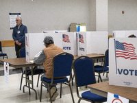 People cast their votes on Election Day in Fairfax County, Virginia, on November 5, 2024. (