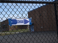 A vote sign is seen outside a Vote Center on Election Day in Fairfax County, Virginia, on November 5, 2024. (