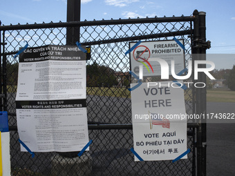 A ''Vote Here'' sign is seen outside a Vote Center on Election Day in Fairfax County, Virginia, on November 5, 2024. (