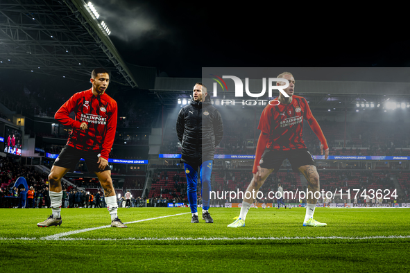 PSV Eindhoven defender Mauro Junior and PSV Eindhoven defender Rick Karsdorp participate in the match between PSV and Girona at the Philips...