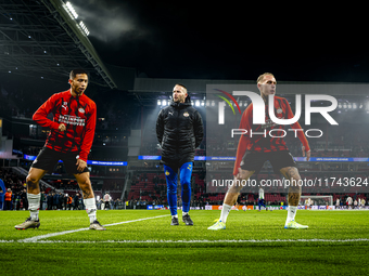 PSV Eindhoven defender Mauro Junior and PSV Eindhoven defender Rick Karsdorp participate in the match between PSV and Girona at the Philips...