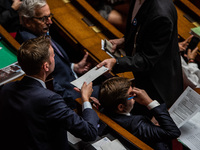 Delivery of letters occurs in Parliament during the question session to the government in Paris, France, on November 5, 2024. (