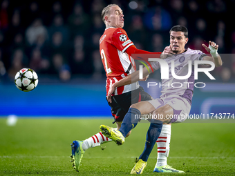 PSV Eindhoven defender Rick Karsdorp and Girona FC defender Miguel Gutierrez play during the match between PSV and Girona at the Philips Sta...