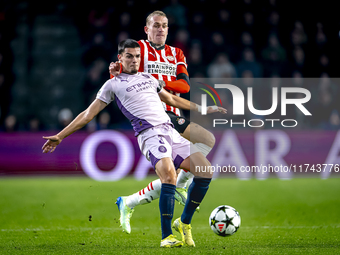 PSV Eindhoven defender Rick Karsdorp and Girona FC defender Miguel Gutierrez play during the match between PSV and Girona at the Philips Sta...