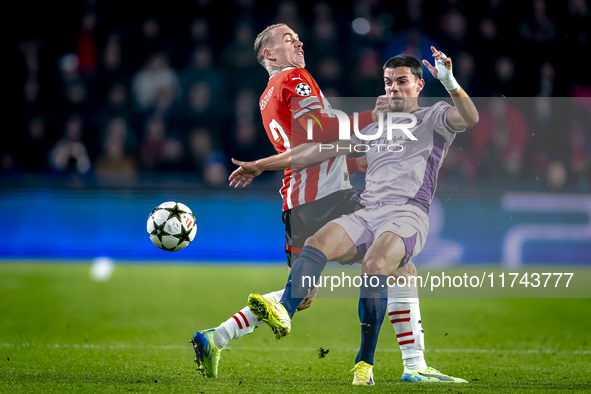 PSV Eindhoven defender Rick Karsdorp and Girona FC defender Miguel Gutierrez play during the match between PSV and Girona at the Philips Sta...