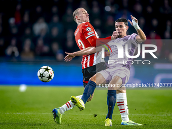 PSV Eindhoven defender Rick Karsdorp and Girona FC defender Miguel Gutierrez play during the match between PSV and Girona at the Philips Sta...