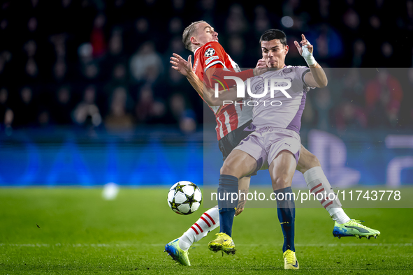 PSV Eindhoven defender Rick Karsdorp and Girona FC defender Miguel Gutierrez play during the match between PSV and Girona at the Philips Sta...