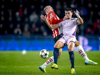 PSV Eindhoven defender Rick Karsdorp and Girona FC defender Miguel Gutierrez play during the match between PSV and Girona at the Philips Sta...