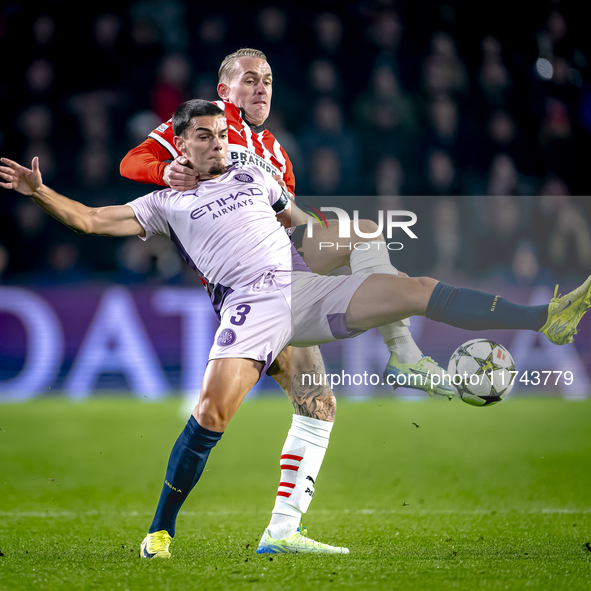 PSV Eindhoven defender Rick Karsdorp and Girona FC defender Miguel Gutierrez play during the match between PSV and Girona at the Philips Sta...