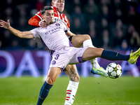 PSV Eindhoven defender Rick Karsdorp and Girona FC defender Miguel Gutierrez play during the match between PSV and Girona at the Philips Sta...