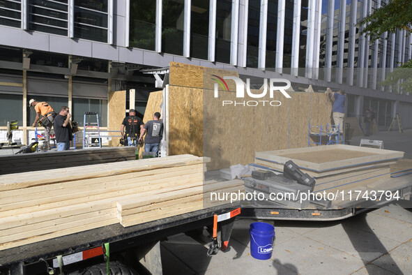 Downtown DC businesses board up windows during the Presidential Election in Washington DC, USA, on November 5, 2024, at 19th Street. 