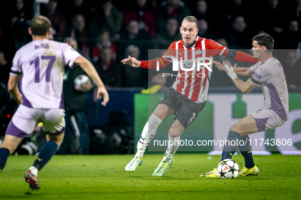 PSV Eindhoven defender Rick Karsdorp and Girona FC defender Miguel Gutierrez play during the match between PSV and Girona at the Philips Sta...