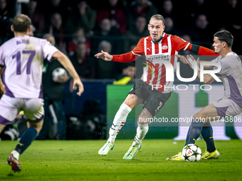 PSV Eindhoven defender Rick Karsdorp and Girona FC defender Miguel Gutierrez play during the match between PSV and Girona at the Philips Sta...