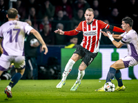 PSV Eindhoven defender Rick Karsdorp and Girona FC defender Miguel Gutierrez play during the match between PSV and Girona at the Philips Sta...