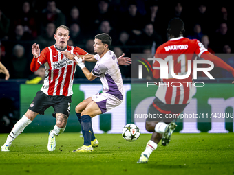 PSV Eindhoven defender Rick Karsdorp and Girona FC defender Miguel Gutierrez play during the match between PSV and Girona at the Philips Sta...