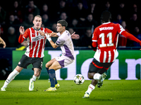 PSV Eindhoven defender Rick Karsdorp and Girona FC defender Miguel Gutierrez play during the match between PSV and Girona at the Philips Sta...