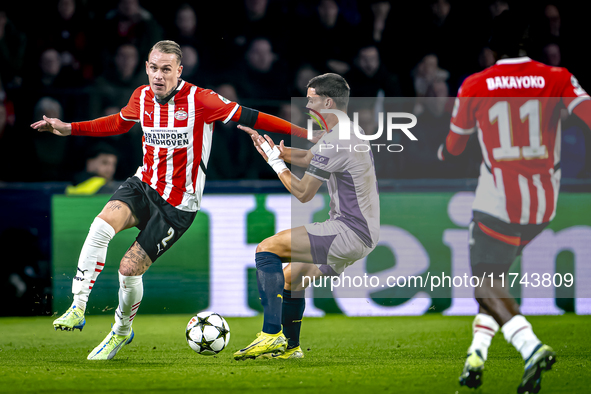 PSV Eindhoven defender Rick Karsdorp and Girona FC defender Miguel Gutierrez play during the match between PSV and Girona at the Philips Sta...