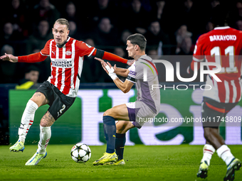 PSV Eindhoven defender Rick Karsdorp and Girona FC defender Miguel Gutierrez play during the match between PSV and Girona at the Philips Sta...