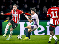 PSV Eindhoven defender Rick Karsdorp and Girona FC defender Miguel Gutierrez play during the match between PSV and Girona at the Philips Sta...