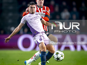 PSV Eindhoven defender Rick Karsdorp and Girona FC defender Miguel Gutierrez play during the match between PSV and Girona at the Philips Sta...