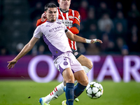 PSV Eindhoven defender Rick Karsdorp and Girona FC defender Miguel Gutierrez play during the match between PSV and Girona at the Philips Sta...