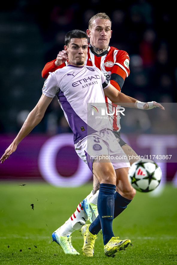 PSV Eindhoven defender Rick Karsdorp and Girona FC defender Miguel Gutierrez play during the match between PSV and Girona at the Philips Sta...