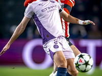 PSV Eindhoven defender Rick Karsdorp and Girona FC defender Miguel Gutierrez play during the match between PSV and Girona at the Philips Sta...