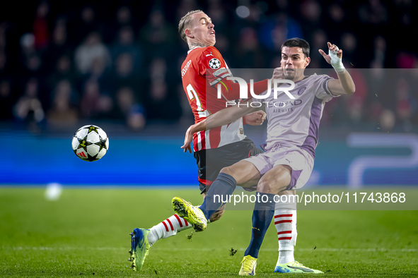 PSV Eindhoven defender Rick Karsdorp and Girona FC defender Miguel Gutierrez play during the match between PSV and Girona at the Philips Sta...