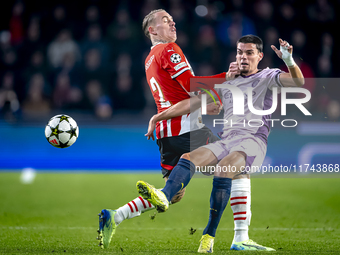 PSV Eindhoven defender Rick Karsdorp and Girona FC defender Miguel Gutierrez play during the match between PSV and Girona at the Philips Sta...