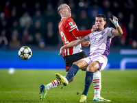 PSV Eindhoven defender Rick Karsdorp and Girona FC defender Miguel Gutierrez play during the match between PSV and Girona at the Philips Sta...