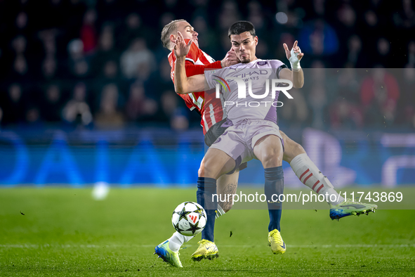 PSV Eindhoven defender Rick Karsdorp and Girona FC defender Miguel Gutierrez play during the match between PSV and Girona at the Philips Sta...