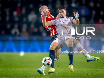 PSV Eindhoven defender Rick Karsdorp and Girona FC defender Miguel Gutierrez play during the match between PSV and Girona at the Philips Sta...