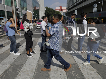 Americans and people living in Mexico go to the United States embassy in Mexico City, Mexico, on November 5, 2024, for the elections in the...