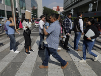 Americans and people living in Mexico go to the United States embassy in Mexico City, Mexico, on November 5, 2024, for the elections in the...