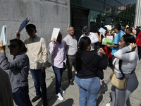 Americans and people living in Mexico go to the United States embassy in Mexico City, Mexico, on November 5, 2024, for the elections in the...