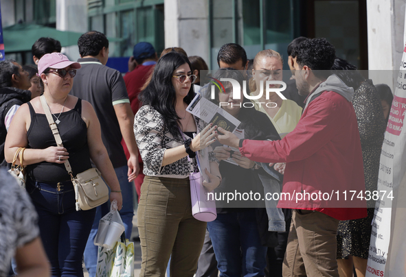 Americans and people living in Mexico go to the United States embassy in Mexico City, Mexico, on November 5, 2024, for the elections in the...