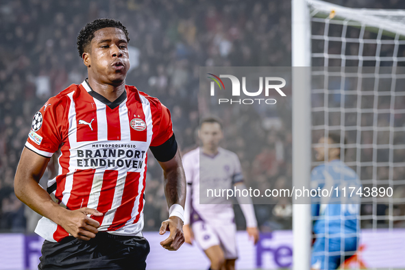 PSV Eindhoven defender Ryan Flamingo scores the 1-0 and celebrates the goal during the match between PSV and Girona at the Philips Stadium f...