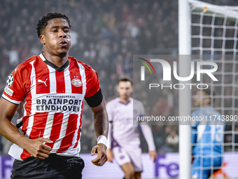 PSV Eindhoven defender Ryan Flamingo scores the 1-0 and celebrates the goal during the match between PSV and Girona at the Philips Stadium f...