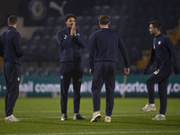 Wycombe Wanderers F.C. players inspect the pitch during the Sky Bet League 1 match between Stockport County and Wycombe Wanderers at the Edg...