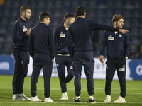 Wycombe Wanderers F.C. players inspect the pitch during the Sky Bet League 1 match between Stockport County and Wycombe Wanderers at the Edg...