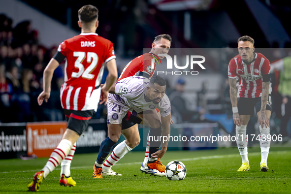 Girona FC midfielder Yangel Herrera and PSV Eindhoven forward Luuk de Jong play during the match between PSV and Girona at the Philips Stadi...