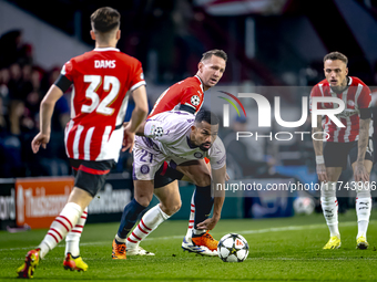 Girona FC midfielder Yangel Herrera and PSV Eindhoven forward Luuk de Jong play during the match between PSV and Girona at the Philips Stadi...