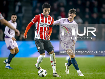 PSV Eindhoven midfielder Malik Tillman and Girona FC midfielder Silvi Clua play during the match between PSV and Girona at the Philips Stadi...