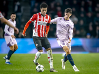 PSV Eindhoven midfielder Malik Tillman and Girona FC midfielder Silvi Clua play during the match between PSV and Girona at the Philips Stadi...